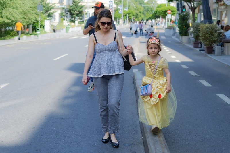 Mother and her girl walking
